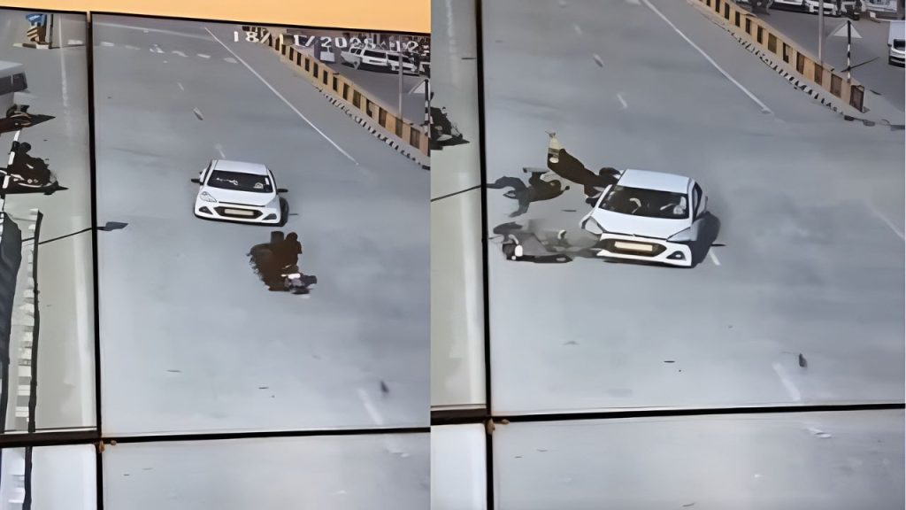 गलत साइड आ रही बाइक और कार में हुई जोरदार टक्कर, हवा में उछले युवक; दिल दहला देने वाला वीडियो आया सामने | Haldwani road accident caught on CCTV Wrong side driving High speed car and bike collide...